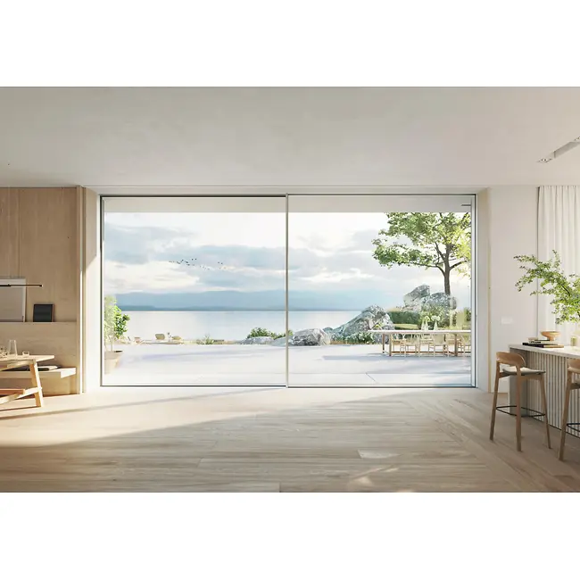 Sistema scorrevole panoramico Schüco con profili sottili e ampie vetrate verso l’esterno