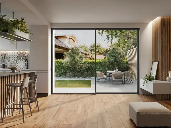 Scorrevole panoramico Schüco ASE 51 PD con profili sottili e soglia a filo pavimento