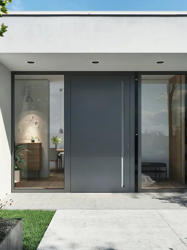 Ingresso di abitazione moderna con porta in alluminio Schüco e parete vetrata laterale