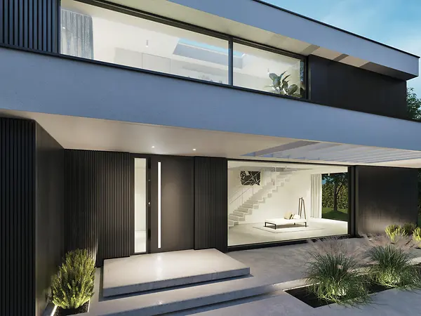 Porta Schüco integrata nella facciata in alluminio con profili coordinati