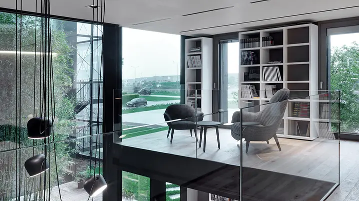 Spazio lounge di Theatro con poltrone, grandi vetrate e vista sull’esterno, pensato per incontri